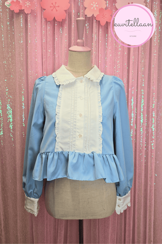 Light blue peplum blouse (second hand)